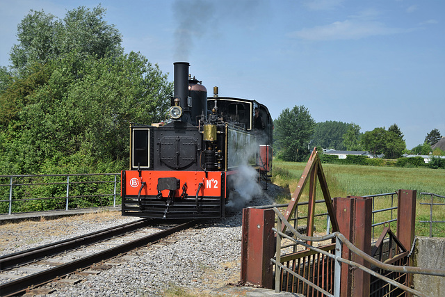 A triangular fence and locomotive #2