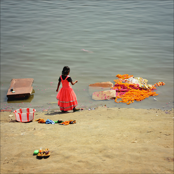 The girl with pink dress.