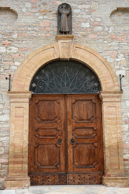 Italy, The Door to the Convent of the Capuchin Friars Minor in Assisi Italy, The Door to the Convent of the Capuchin Friars Minor in Assisi