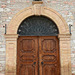 Italy, The Door to the Convent of the Capuchin Friars Minor in Assisi