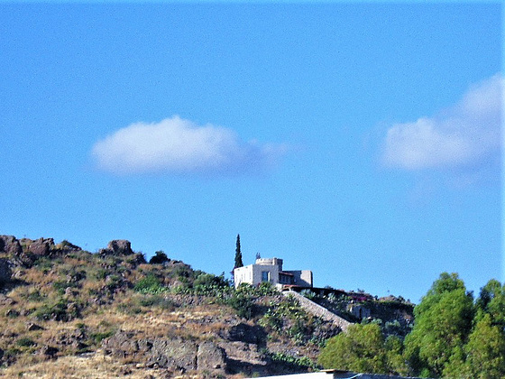 An amazing home at the top of a hill overlooking the bay