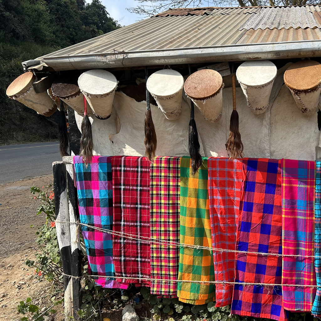 Shukas hanging on a wall.