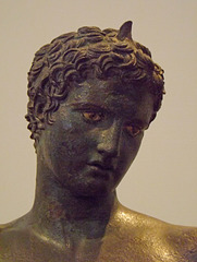 Detail of a Bronze Statue of Young Athlete from Marathon in the National Archaeological Museum in Athens, May 2014