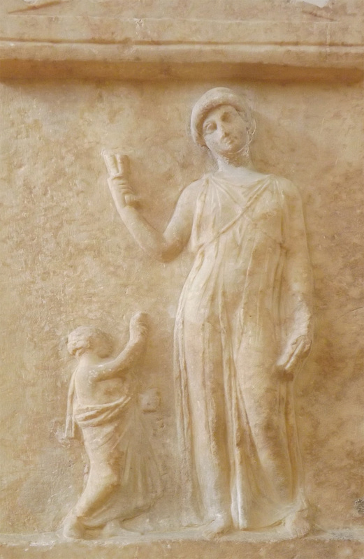 Detail of a Grave Stele with a Dancing Girl and Boy in the National Archaeological Museum in Athens, May 2014