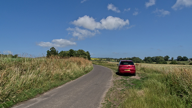 Red Car in the Countryside