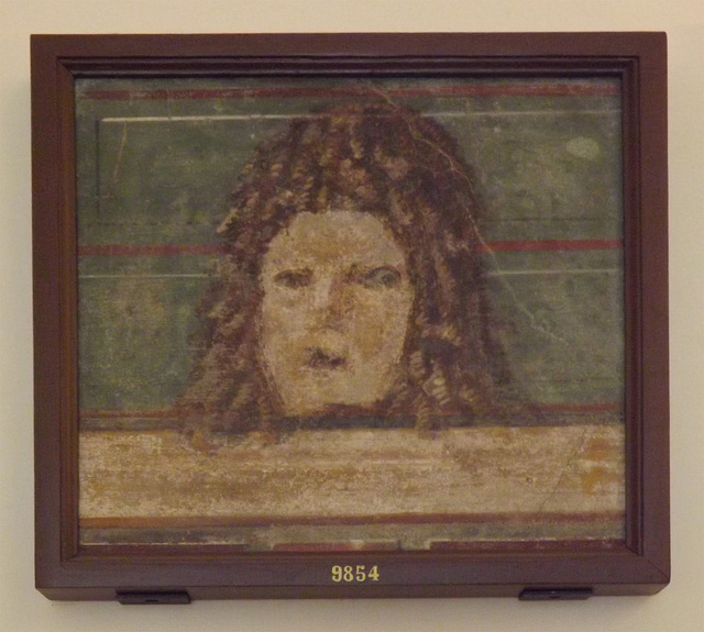 Tragic Mask on Cornice, Wall Painting from Pompeii in the Naples Archaeological Museum, July 2012