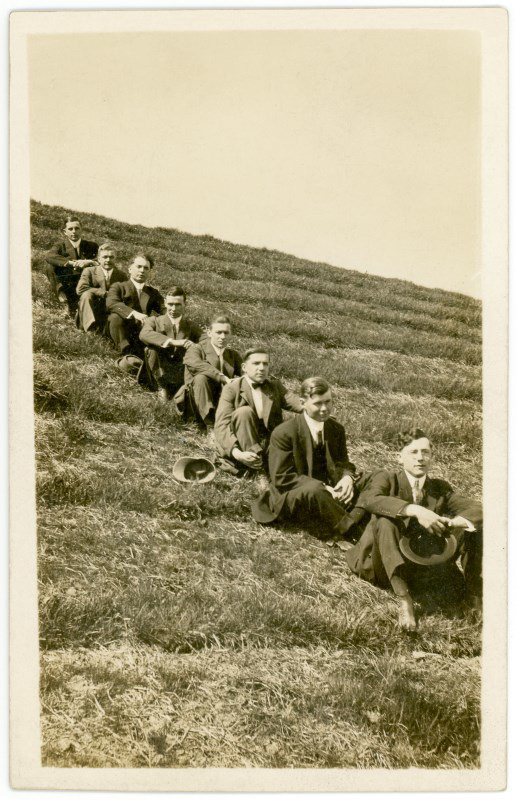 Eight Guys in a Row on a Hill