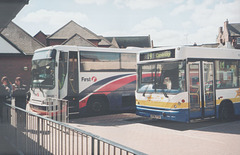 Burtons Coaches X196 FOR and First Eastern Counties P330 RVG at Wisbech - 30 April 2006 (557-28)