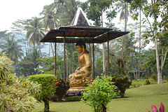 Indonesia, Java, Buddha Statue in the Park of Borobudur