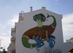 Mural by Gonçalo Mar, inspired on local dinosaurs.