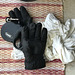 still life with gloves and retractable dog leash