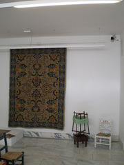 Tapestry and wool winder.