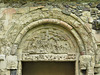 rochester cathedral, kent (107)sacrifice of isaac on the early to mid c12 tympanum of the day stair to the dormitory, in the east walk of the cloister