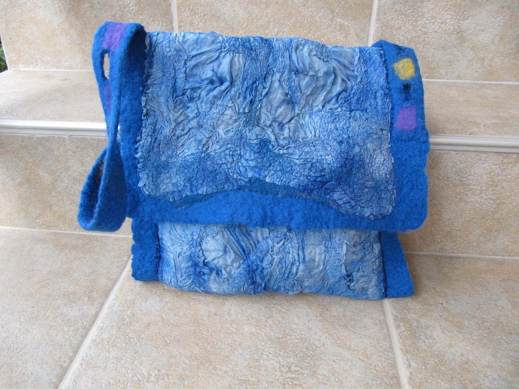 nuno-felted applicaions on a felted bag