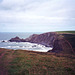 View north from Hartland Quay along the Coastal Path, with the Island of Lundy in the distance (Scan from Aug 1992)