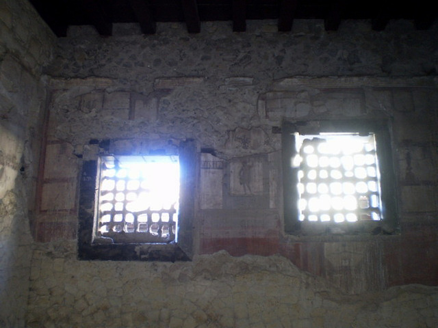 Windows with iron bars.