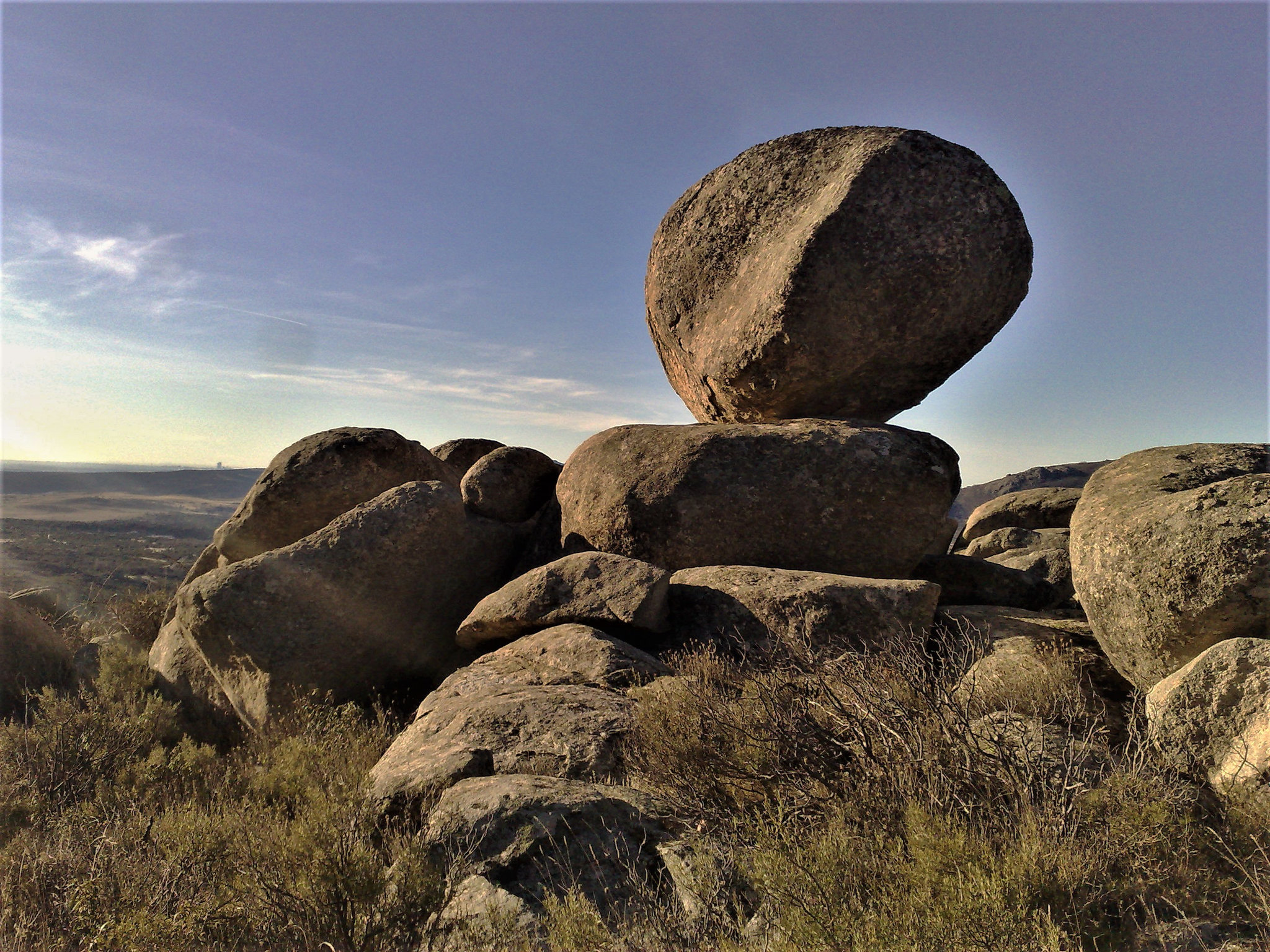 Sierra de La Cabrera. In the far distance; Madrid with the four Towers visible on the horizon.