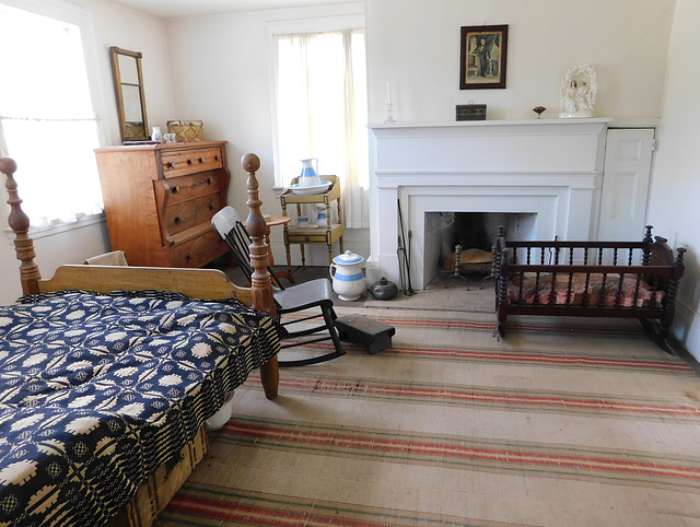 Bedroom in the Noon Inn in Old Bethpage Village, August 2022