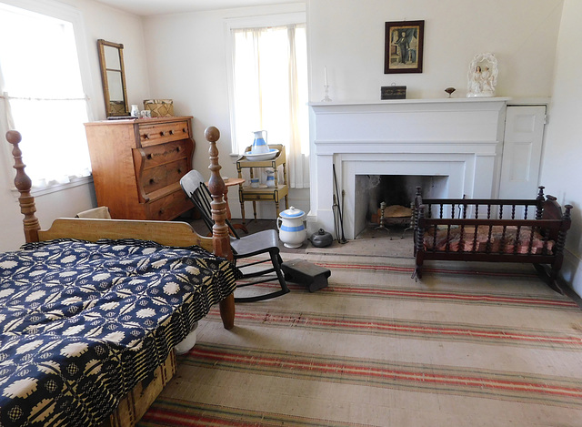 Bedroom in the Noon Inn in Old Bethpage Village, August 2022