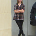 standing with legs crossed