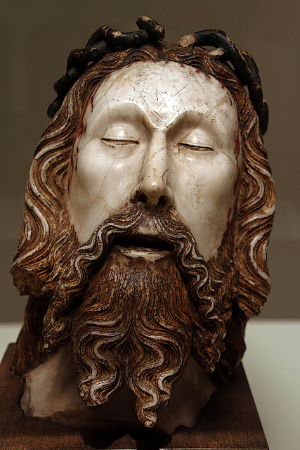 Tête du Christ , oeuvre du XIVe siècle de Jaume Cascalls , connu pour ses effets dramatiques et naturalistes .