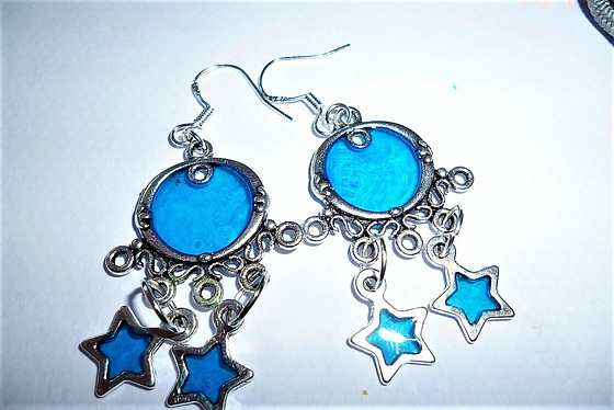 Pale blue earrings with additional starts