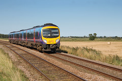 First Trans Peninne class 185 185118 at Willerby Carr Crossing with 1F82 16:50 Scarborough - Liverpool Lime Street service 10th August 2017