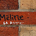 Méline , souffre-douleur . Sur la façade du Collège George Sand , rue de Tolbiac - Paris XIII