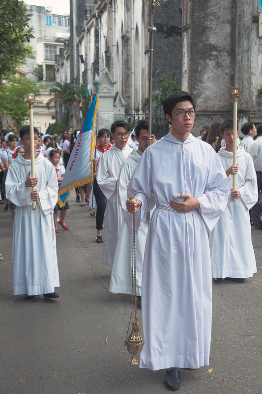 Catholic priests in the procession