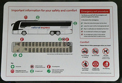 A National Express safety sign on board a Caetano Levante III coach - 14 Nov 2024 (P1200287)