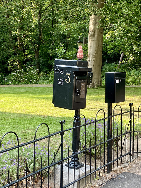 Old postbox turned into a letter box