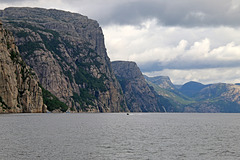 Large cliff, small boat