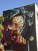 Warping mural, by Hopare.