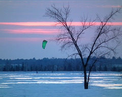 surfing at sunset