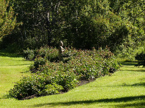 Buddha surveying the Peony garden