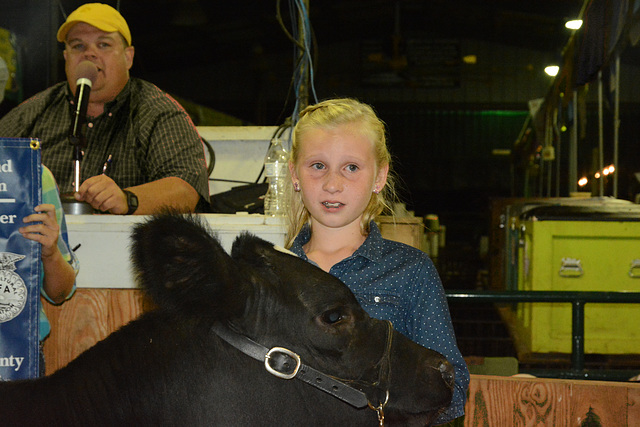 A bittersweet scene . . . her steer sells for $8500, but it's good-bye