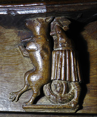 castle hedingham church, essex misericord, perhaps c16.fox carrying priest upside down tie to a pole(31)