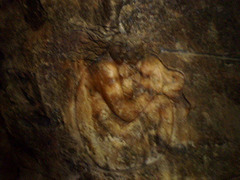 Carving on wall of Loulé's salt mine.