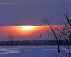 surfing au coucher de soleil