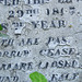 abney park cemetery, stoke newington, london.close up of plaster, paint and ?mastic infil that was common on c19 memorials