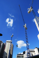 cranes and skyscrapers on london wall