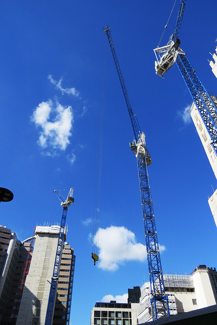 cranes and skyscrapers on london wall