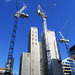 cranes and skyscrapers on london wall