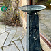Bird bath? That's what she thought when she bought it, but supposedly it is a log burner!