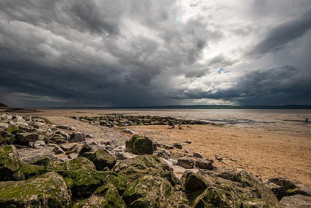 Caldy beach with rain clouds coming in