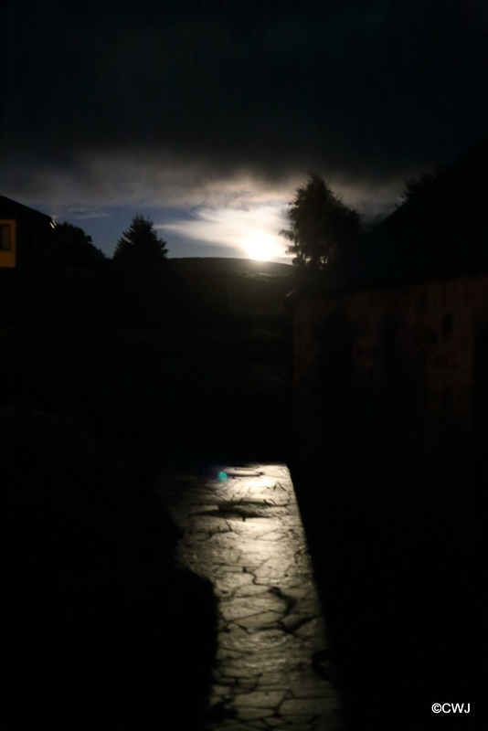 The road was a ribbon of moonlight across the purple moor...