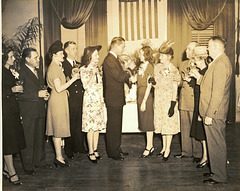 Toasting the bride and groom in the Vintage Photos Theme Park, 14 Feb 1946.