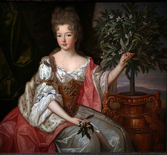 Portrait d'une princesse cueillant des fleurs à un oranger