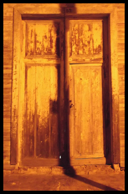 Old golden door by the night