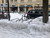 bicycle rack in the snow